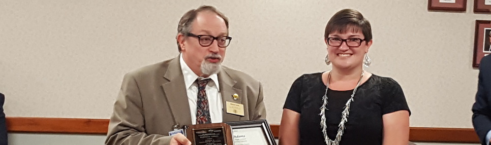 FCS Junior High School Math Teacher Bobbiesue Adams receiving her 2018-2019 Michigan Regional Teacher of the Year plaque August 14, 2018.