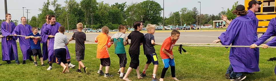 2019 Graduates Joining in on Field Day during the Grad Gauntlet